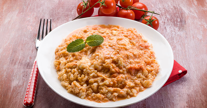 TOMATO RISOTTO WITH BLACK GRAM & ROASTED VEGETABLES