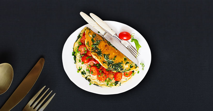 Herby Omelette with Smashed Tomatoes