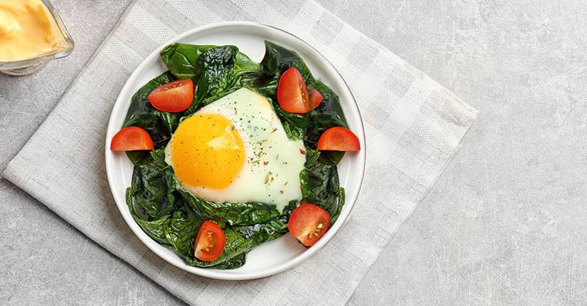 Eggs with Tomato Spinach Sauce